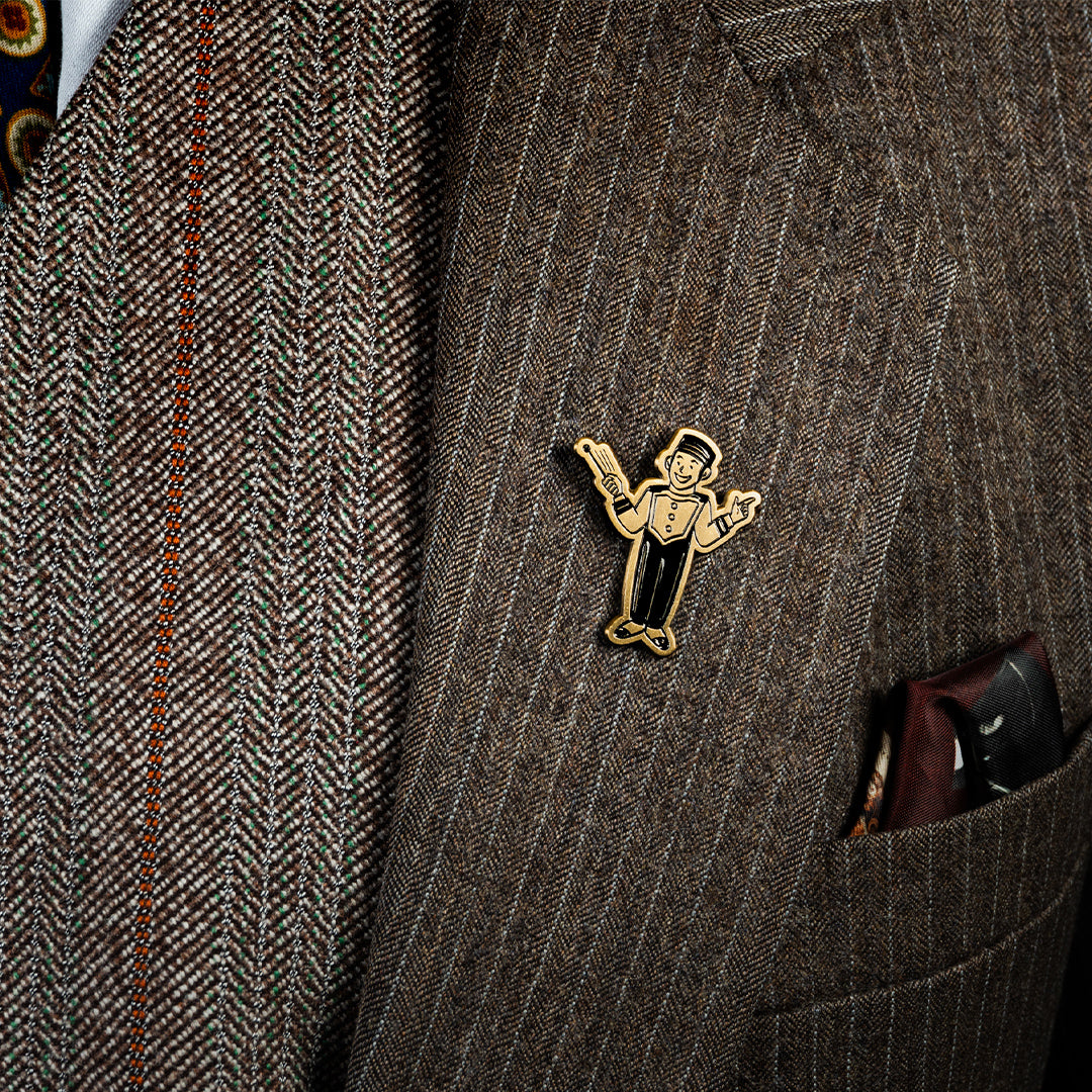 Pin Monito Bronce